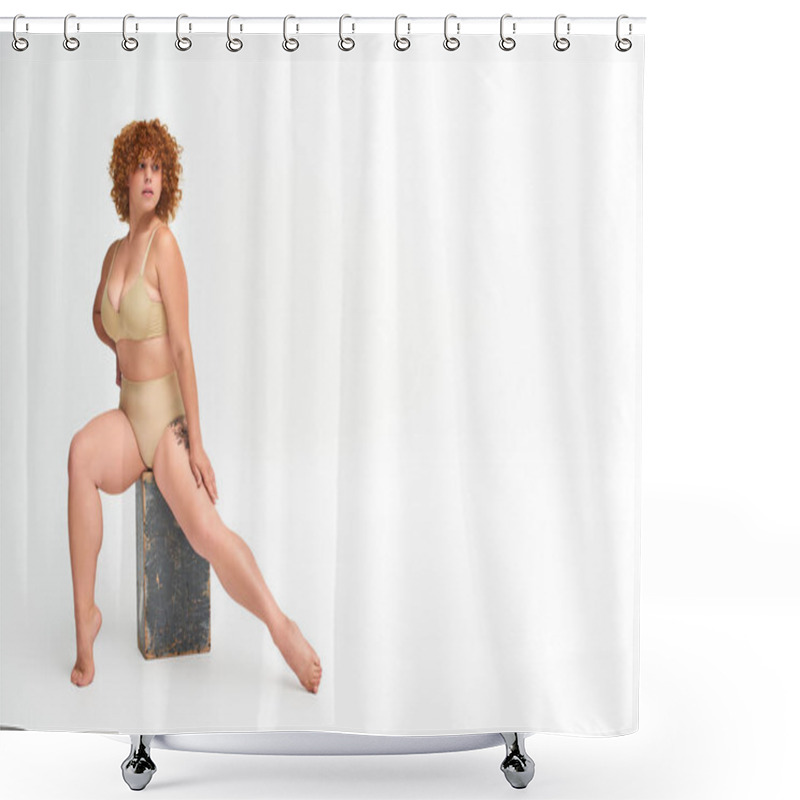 Personality  Full Length Of Expressive Redhead Plus Size Woman In Lingerie Sitting On Grunge Wooden Box On White Shower Curtains