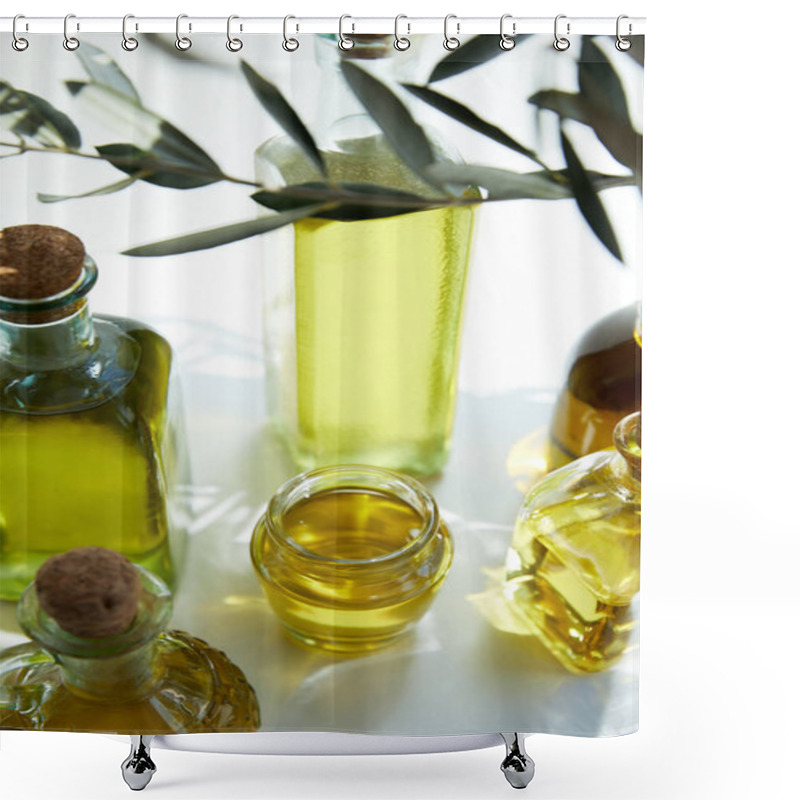 Personality  Close Up View Of Various Bottles Of Aromatic Olive Oil, Branch And Jar On White Table Shower Curtains