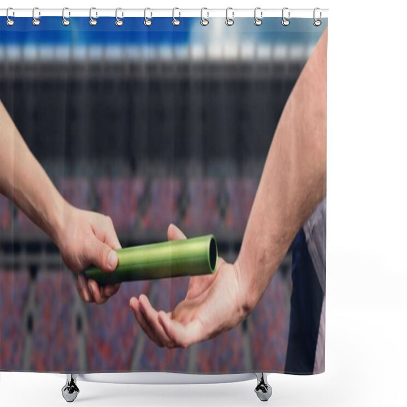 Personality  Mid Section Of Hands Passing A Baton Against Sports Stadium In Background. Sports Competition And Tournament Concept Shower Curtains