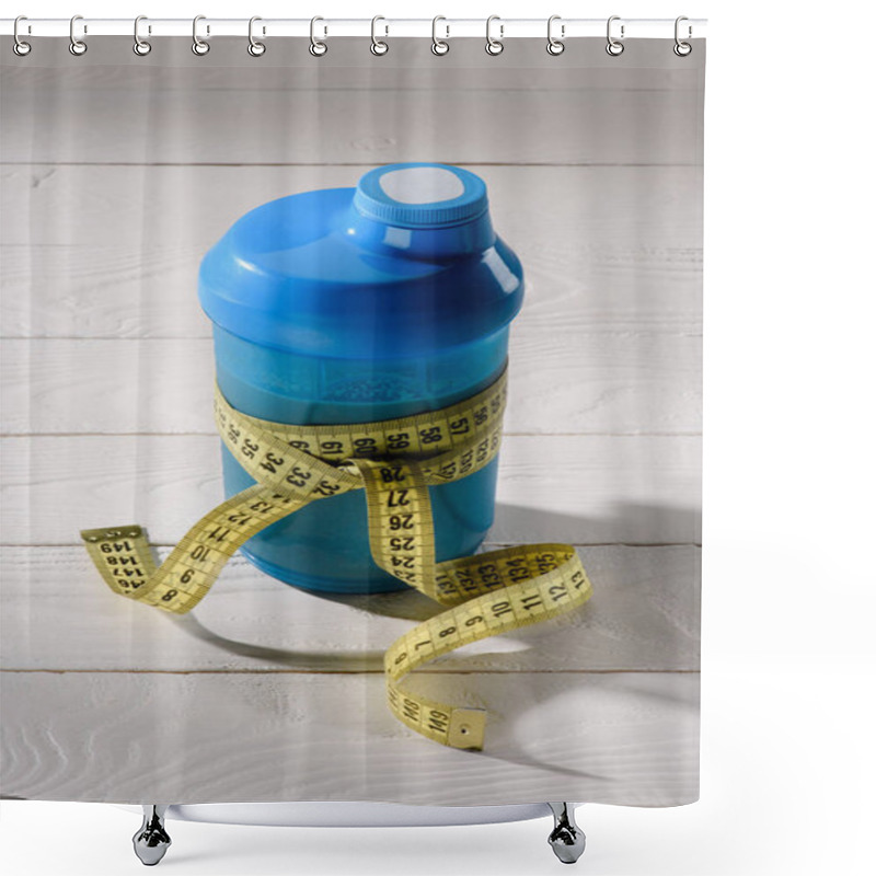 Personality  Close-up Shot Of Protein Shaker Tied With Measuring Tape On White Wooden Table Shower Curtains