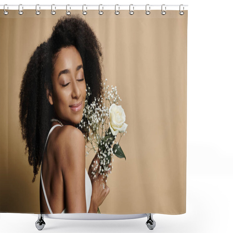 Personality  A Beautiful African American Woman With Natural Makeup Holds A Bouquet Of White Flowers Against A Beige Background. Shower Curtains