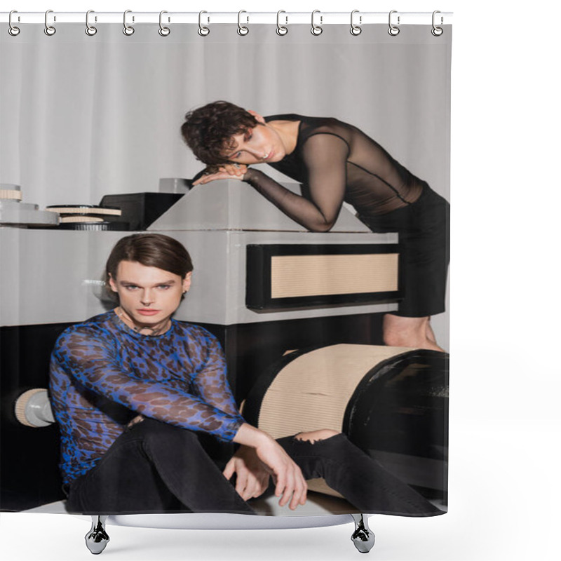 Personality  Trendy Nonbinary Person In Animal Print Top Sitting Near Partner And Model Of Photo Camera On Grey Background Shower Curtains