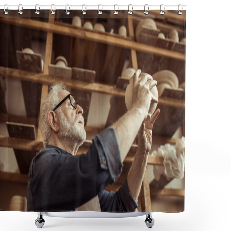 Personality  Senior Potter In Apron And Eyeglasses Examining Ceramic Bowl At Workshop Shower Curtains