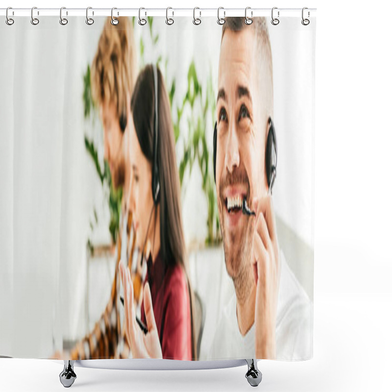 Personality  Panoramic Shot Of Cheerful Broker In Headset Gesturing In Office With Coworkers  Shower Curtains