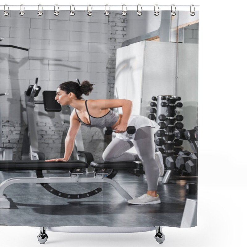 Personality  Side View Of Middle East Sportswoman Exercising With Dumbbell On Flat Bench In Sports Center  Shower Curtains