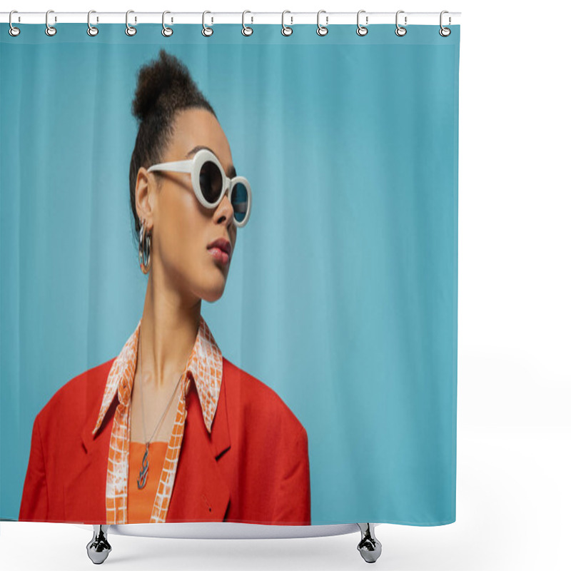 Personality  Portrait Of African American Woman In Hoop Earrings, Sunglasses And Vibrant Outfit Posing On Blue Shower Curtains