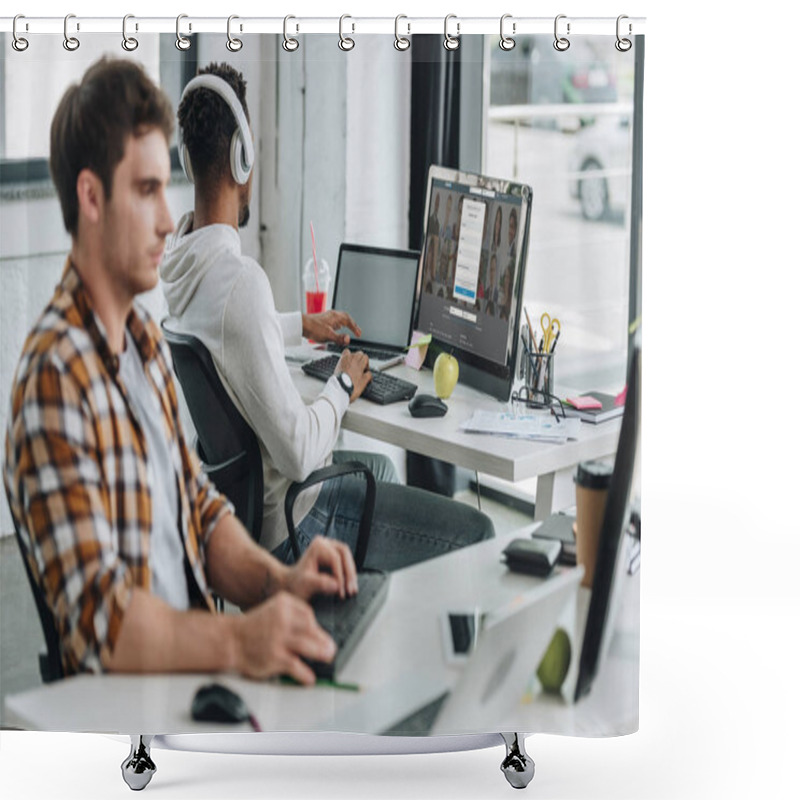 Personality  KYIV, UKRAINE - JULY 29, 2019: Back View Of African American Programmer Using Computer With Linkedin Website On Monitor While Working Near Colleague Shower Curtains