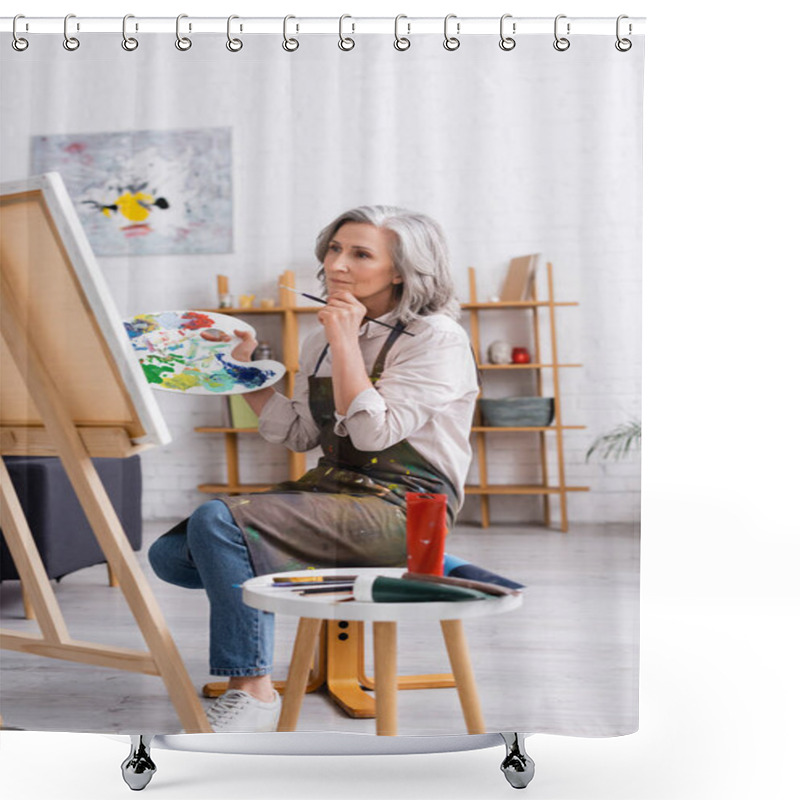 Personality  Pensive Mature Artist Holding Paintbrush And Palette While Sitting Near Canvas  Shower Curtains