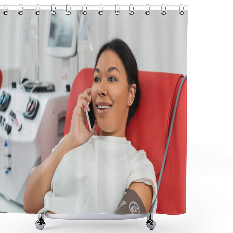 Personality  Young And Cheerful Multiracial Woman Talking On Smartphone While Sitting On Medical Chair Near Blurred Transfusion Machine In Blood Donation Center  Shower Curtains