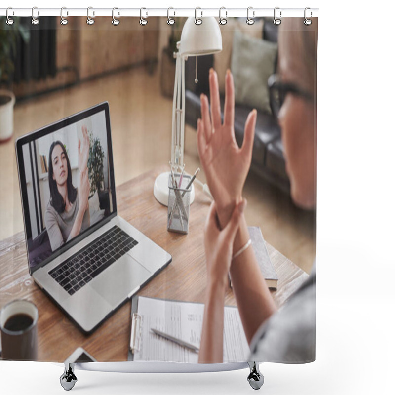 Personality  Modern Young Adult Female Doctor Sitting At Desk In Front Of Laptop Working With Patient Online On Video Call Explaining How To Palpate Wrist Shower Curtains