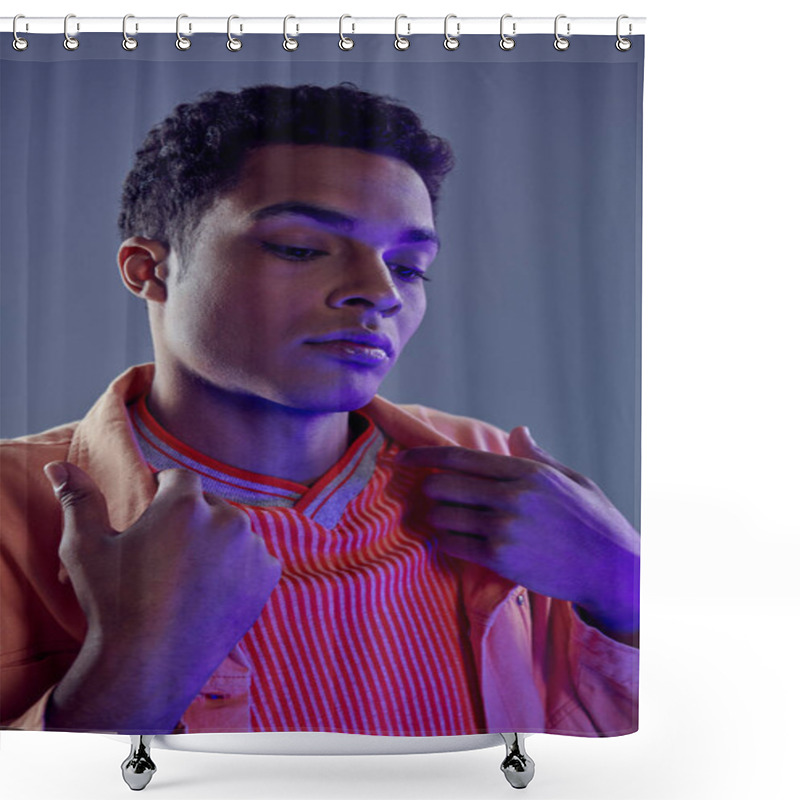 Personality  Portrait Of Handsome African American Man In Peach Shirt Posing On Grey Background With Blue Light Shower Curtains