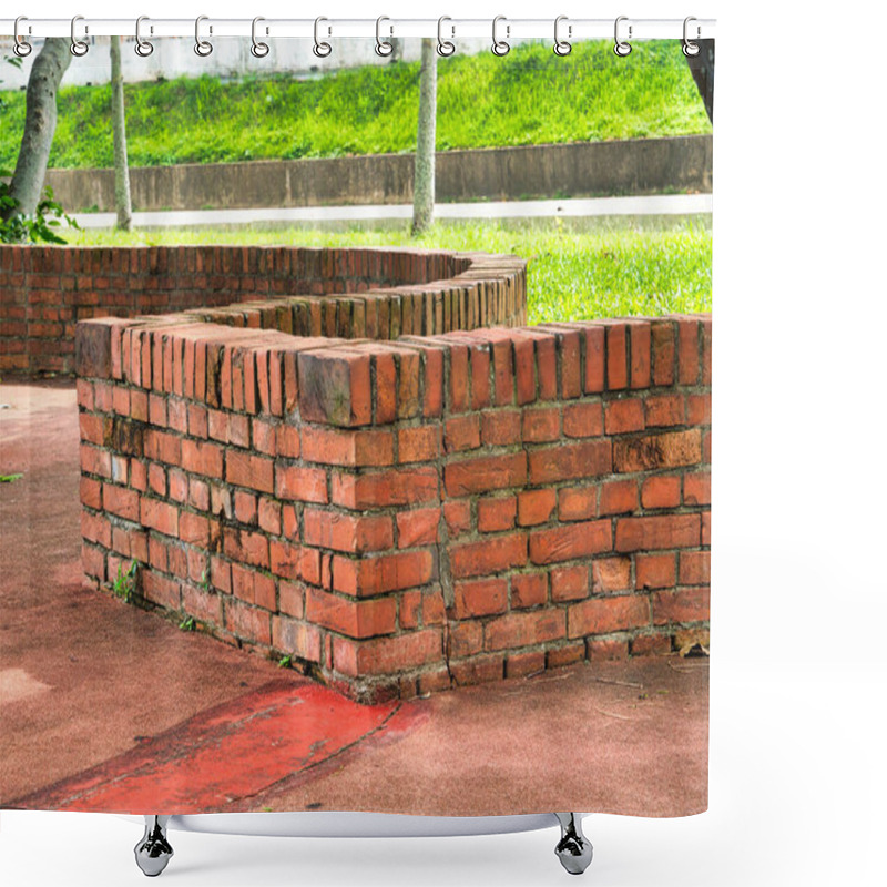 Personality  Curved Brick Benches And Concrete Seats Rest Under The Shade Of Leafy Trees On A Red-paved Surface Surrounded By Lush Green Grass. Shower Curtains