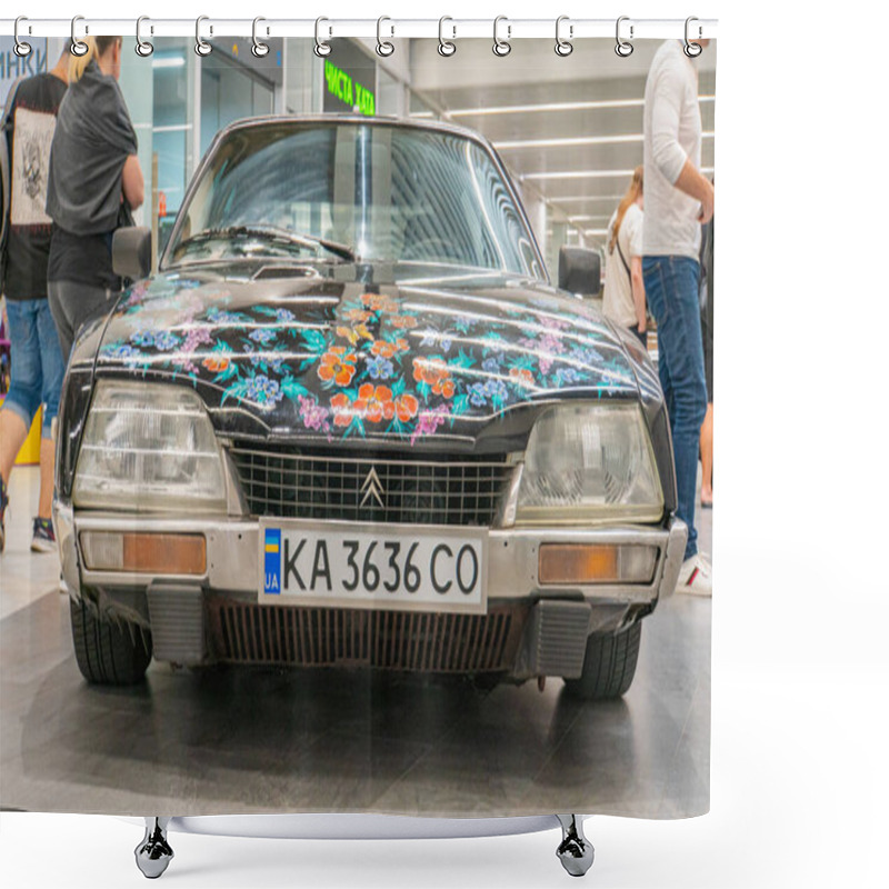 Personality  A Classic Hatchback Car With A Custom Floral Paint Job Featuring Shades Of Blue, Pink, And Orange, Is Displayed Indoors In A Museum Or Exhibition Spac Kyiv, Ukraine 06-06-2024 Shower Curtains