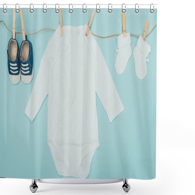 Personality  Top View Of Baby Clothes Drying On Rope Isolated On Blue Shower Curtains