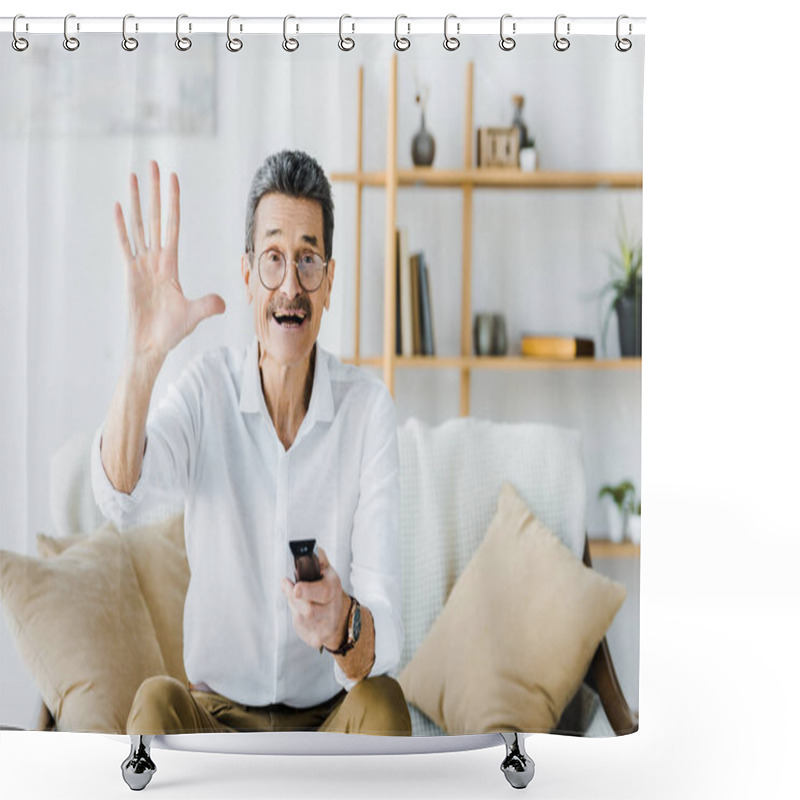 Personality  Cheerful Senior Man Sitting On Sofa And Holding Remote Control While Waving Hand Shower Curtains