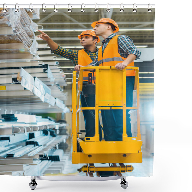 Personality  Serious Indian Worker Pointing With Finger At Construction Materials While Standing On Scissor Lift Near Colleague  Shower Curtains