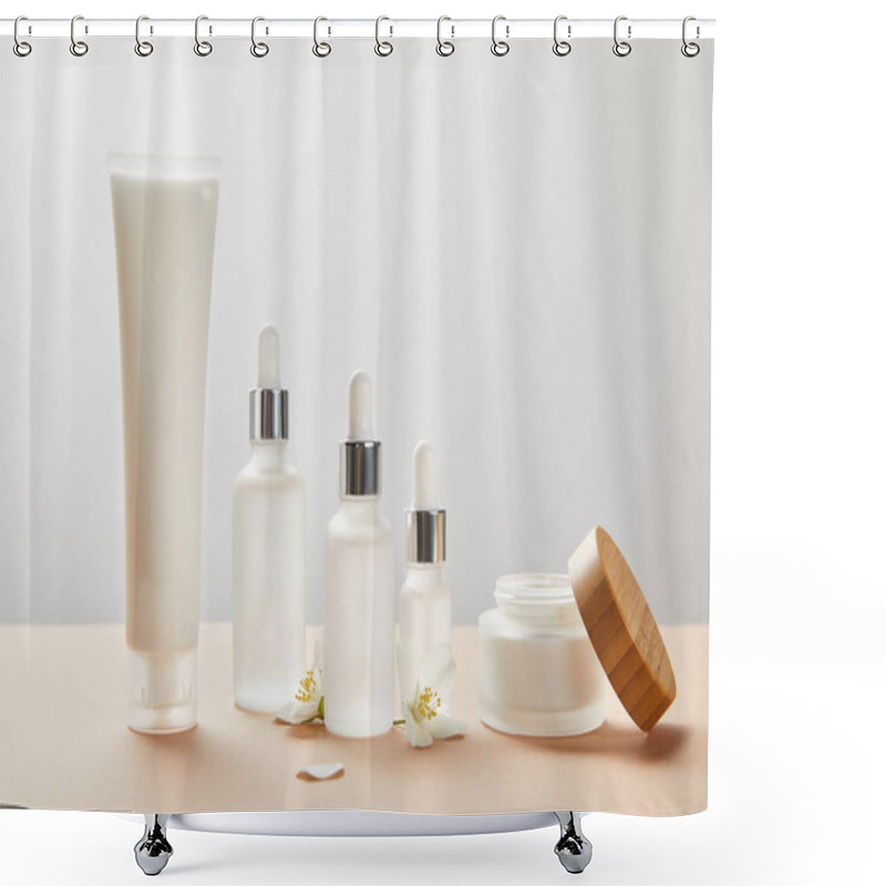 Personality  Cream Tube, Cosmetic Glass Bottles, Open Jar With Cream And Few Jasmine Flowers On Beige  Shower Curtains