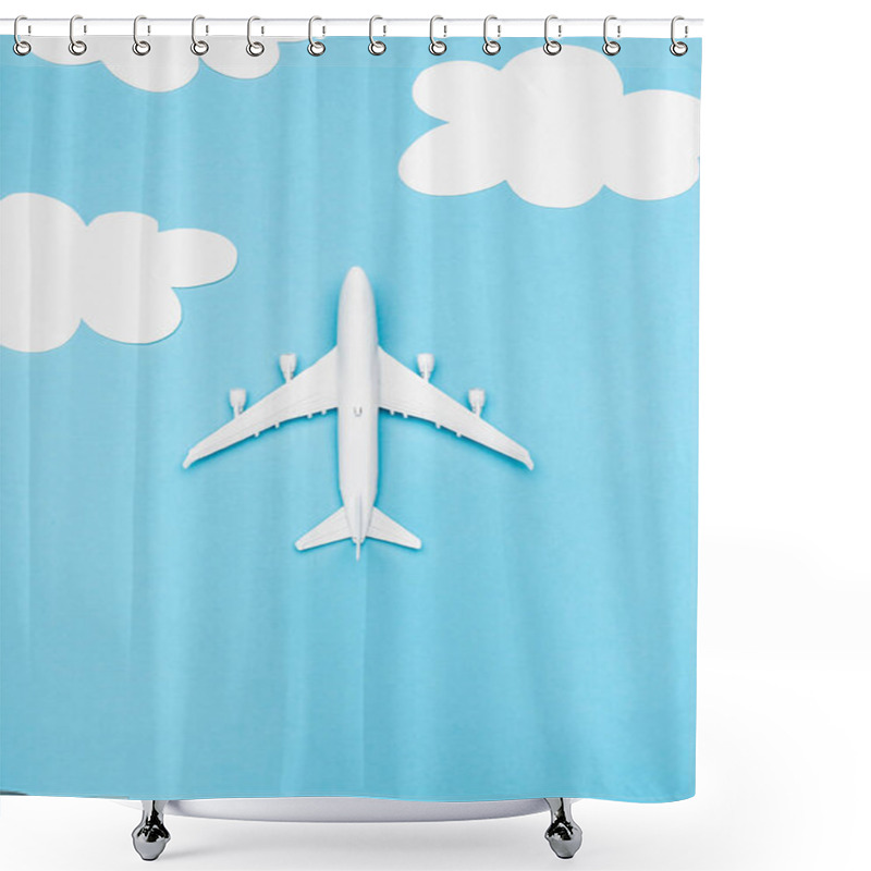 Personality  Top View Of White Plane Model On Blue Background With White Clouds Shower Curtains