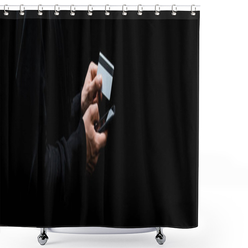 Personality  Panoramic Shot Of Hacker Using Smartphone And Holding Credit Card Isolated On Black  Shower Curtains