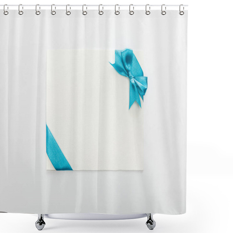 Personality  Top View Of Blank Card With Blue Decorative Satin Ribbon And Bow On White Background Shower Curtains