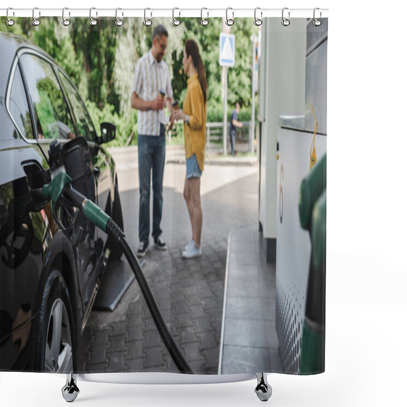 Personality  Selective Focus Of Fueling Nozzle In Gas Tank Of Car And Couple Holding Paper Cups On Urban Street  Shower Curtains