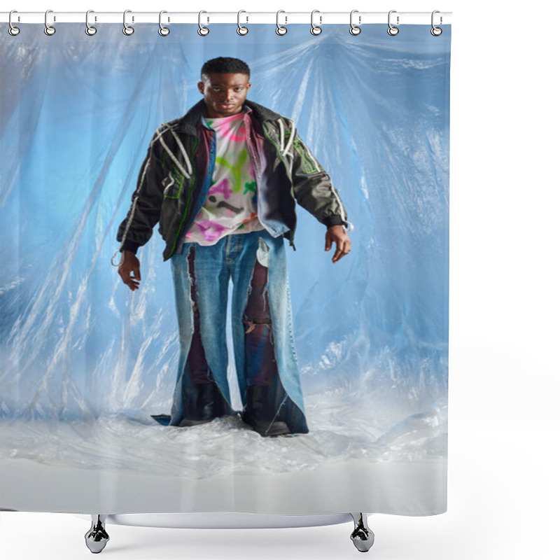 Personality  Full Length Of Fashionable Young Afroamerican Man In Outwear Jacket With Led Stripes And Ripped Jeans Looking At Camera While Standing On Glossy Cellophane On Blue Background, Sustainable Lifestyle  Shower Curtains