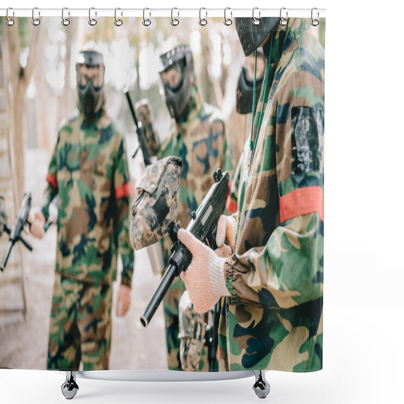 Personality  Partial View Of Paintball Team In Camouflage And Protective Masks Standing With Paintball Guns Outdoors  Shower Curtains