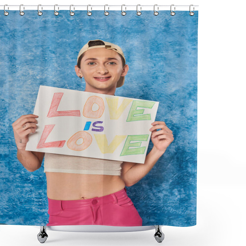 Personality  Positive Gay Activist In Baseball Cap And White Tank Top Smiling While Holding Placard With Love Is Love Words During Pride Month On Mottled Blue Background  Shower Curtains