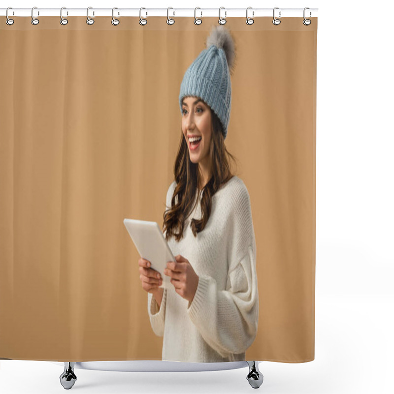 Personality  Stunning Curly Girl In Knitted Hat Holding Digital Tablet And Laughing Isolated On Beige Shower Curtains