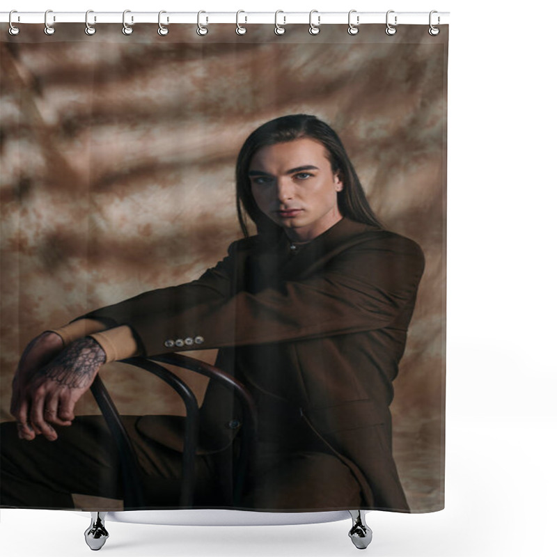 Personality  Portrait Of Trendy Young Nonbinary Person Sitting On Chair On Abstract Brown Background Shower Curtains