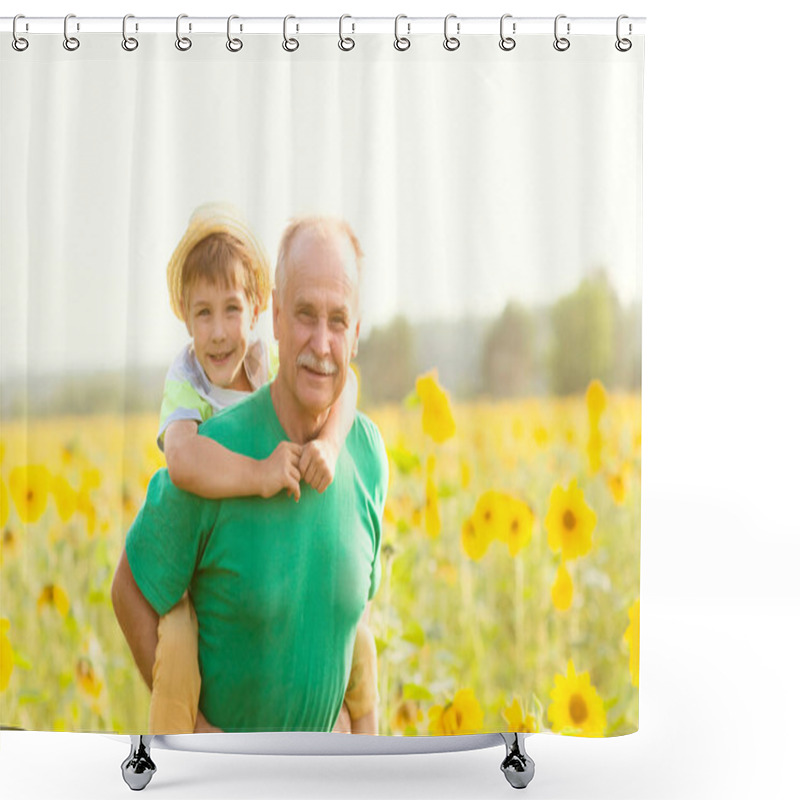 Personality  Grandson Is Sitting On His Grandfather On Walk In The Summer Outdoors In Sunflower Field. Concept Of Friendly Family. Shower Curtains