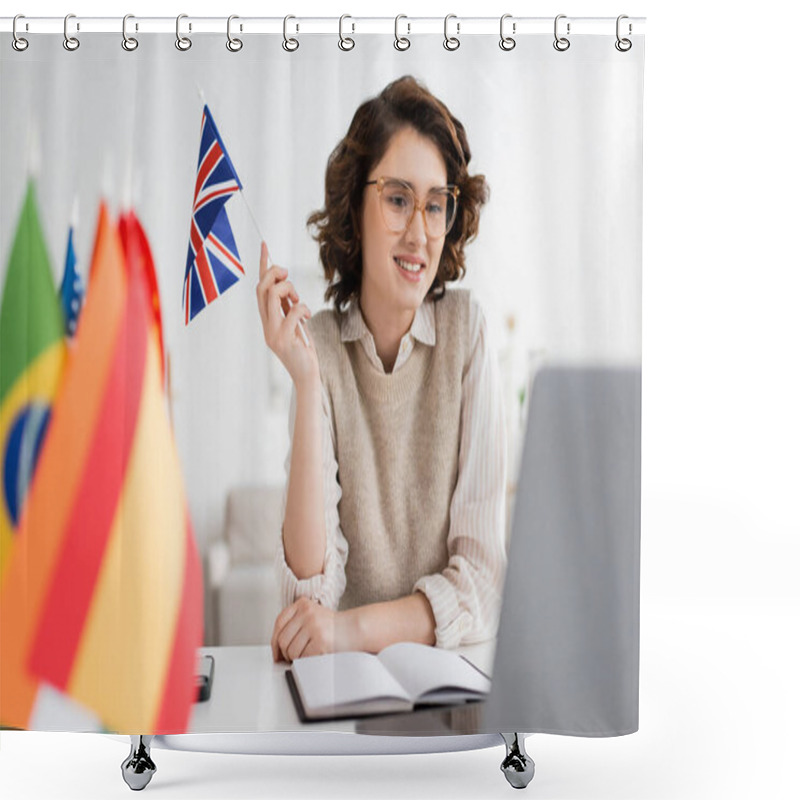 Personality  Smiling Language Teacher In Eyeglasses Holding Flag Of United Kingdom Near Notebook And Blurred Laptop  Shower Curtains