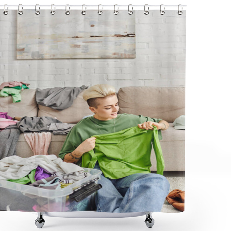 Personality  Young Woman With Trendy Hairstyle And Tattoo, Holding Green Garment Near Plastic Container And Couch With Clothes, Sorting, Conscious Decluttering, Sustainable Living And Mindful Consumerism Concept Shower Curtains