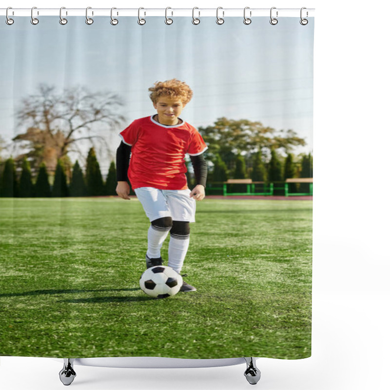 Personality  A Young Boy Displaying His Soccer Skills By Confidently Kicking A Soccer Ball On A Grassy Field. His Focus And Determination Shine Through As He Practices His Technique On The Pitch. Shower Curtains