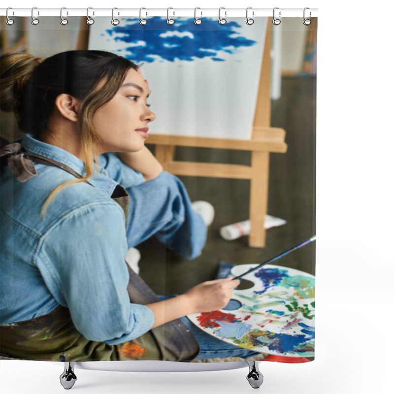 Personality  Woman In Blue Apron Holds Paintbrush In Workshop, Lost In Thought Over Her Painting. Shower Curtains