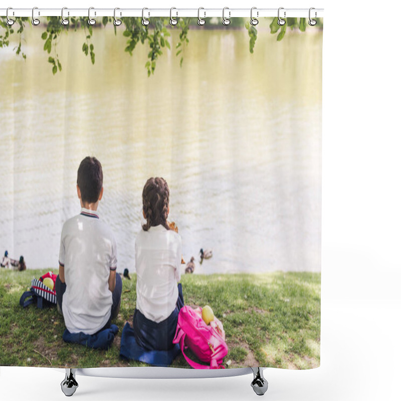 Personality  Rear View Of Schoolchildren Sitting On Lake Bank And Feeding Ducks Shower Curtains