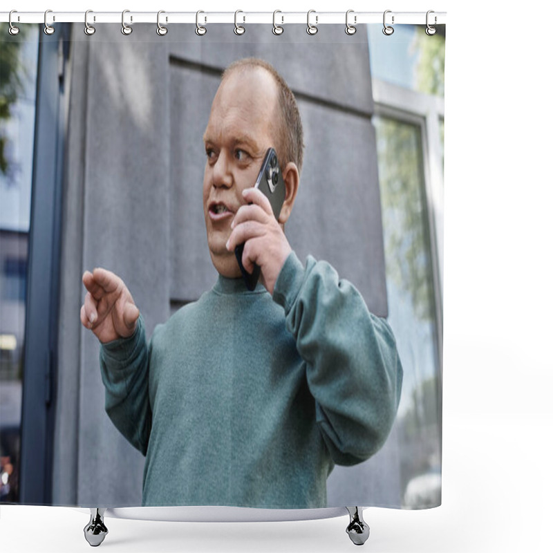 Personality  A Man With Inclusivity In A Teal Sweater Talks Animatedly On His Phone Outside A Building. Shower Curtains