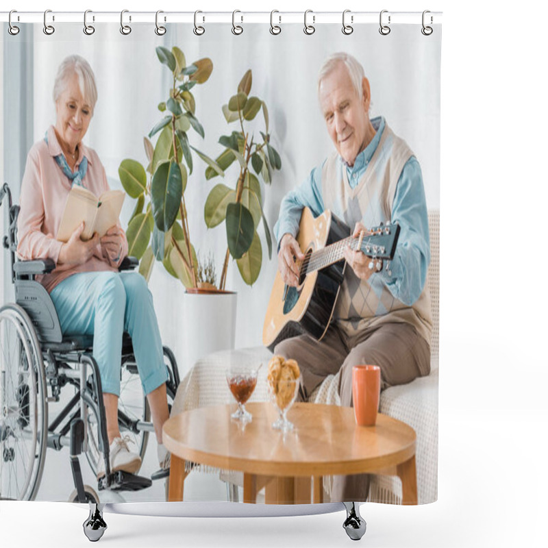 Personality  Senior Woman Sitting In Wheelchair And Reading Book While Senior Man Playing Acoustic Guitar Shower Curtains