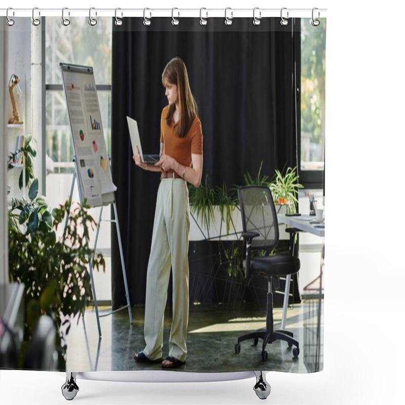 Personality  A Young Non Binary Person Examines Charts While Standing In A Modern Office Filled With Greenery. Shower Curtains