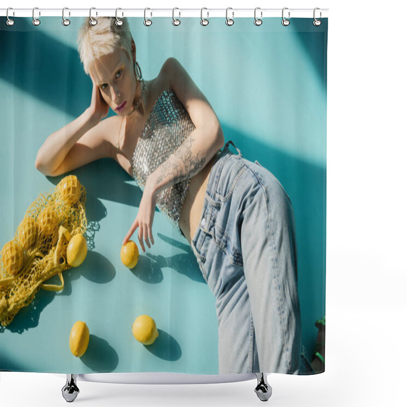 Personality  Overhead View Of Tattooed Albino Woman In Top With Sequins And Jeans Lying Near Ripe Lemons On Blue  Shower Curtains