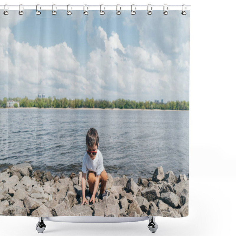 Personality  Stylish Boy In Sunglasses Touching Rock While Sitting Near Lake Shower Curtains