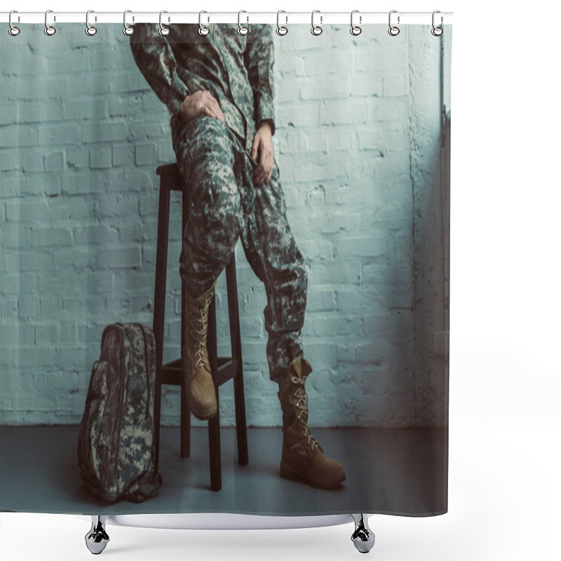 Personality  Partial View Of Soldier In Military Uniform Sitting On Chair Against White Brick Wall Shower Curtains