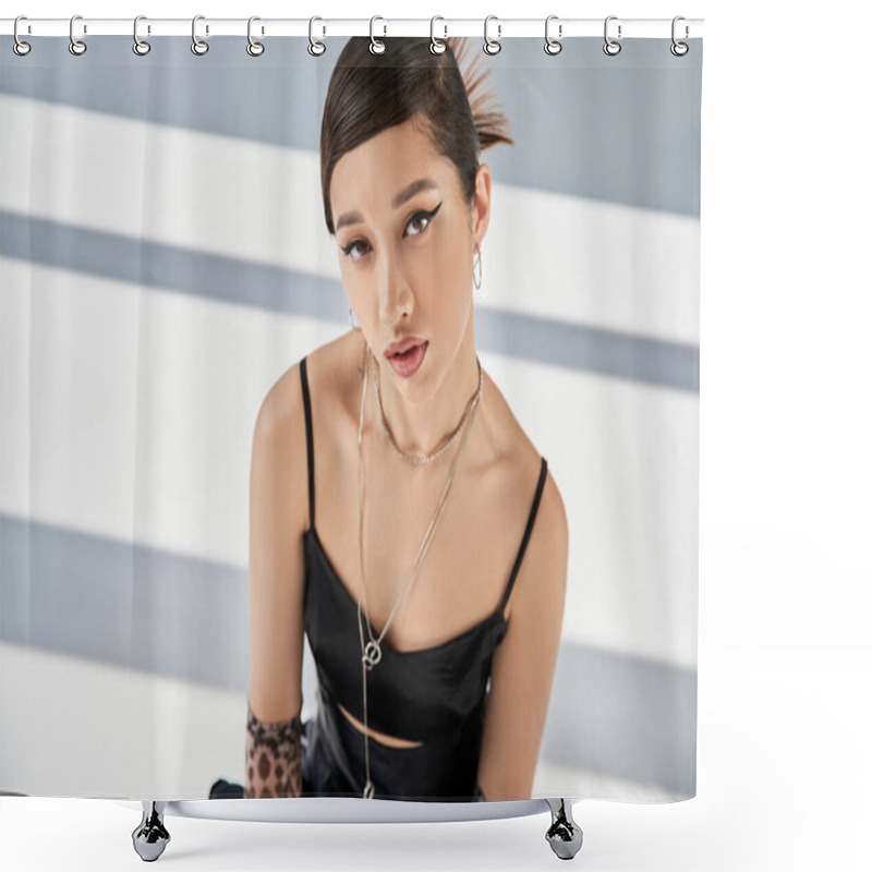 Personality  Spring Fashion, Attractive Asian Woman With Bold Makeup, Trendy Hairstyle And Silver Accessories Posing In Black Strap Dress And Looking At Camera On Grey Background With Lighting And Shadows Shower Curtains