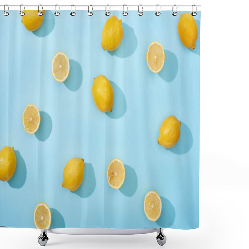 Personality  Top View Of Whole And Cut Yellow Lemons On Blue Background Shower Curtains