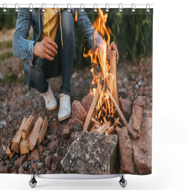 Personality  Cropped View Of Man Sitting And Putting Log In Burning Bonfire  Shower Curtains