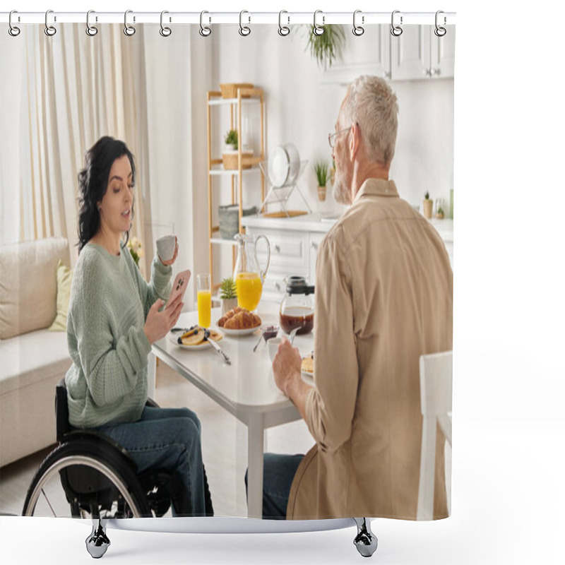 Personality  A Man And Woman In Wheelchair Share A Moment At A Kitchen Table In Their Home, Embracing To Express Their Love And Unity. Shower Curtains