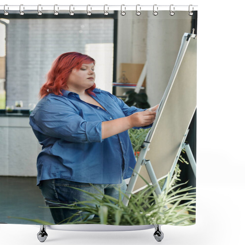 Personality  A Plus Size Woman In A Blue Shirt And Jeans Focuses Intently On A Blank Canvas. Shower Curtains