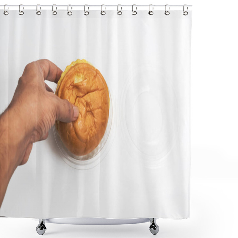 Personality  Top View Of A Hand Holding A Butter Bun In A Plastic Container On A White Background Shower Curtains