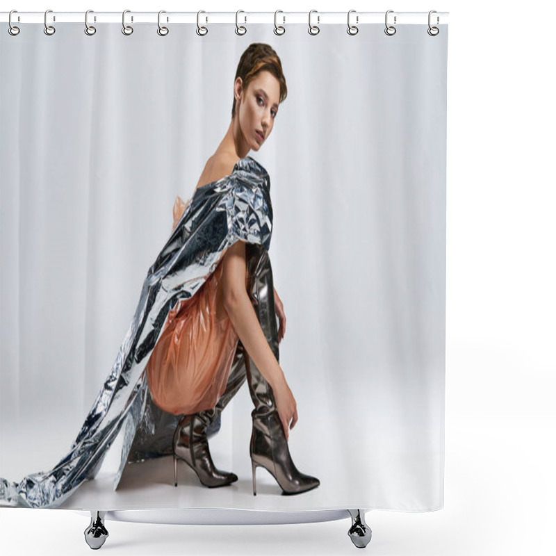 Personality  A Woman In A Silver Sustainable Fashion Piece, Adjusts Her Boots. Shower Curtains