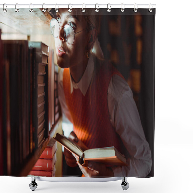 Personality  Pretty Woman In Glasses Holding Book And Looking Away In Library  Shower Curtains